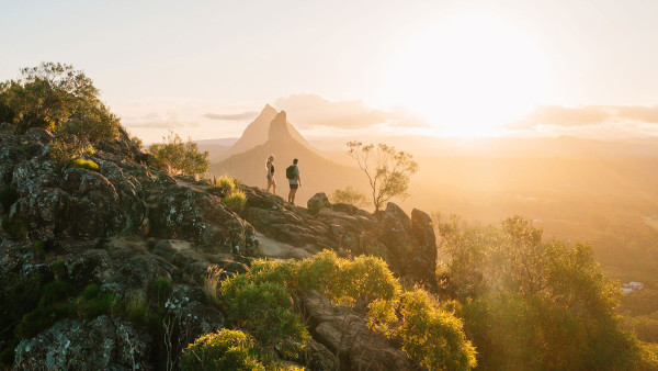 Couple walking scenic landscape of Gold Coast Hinterland