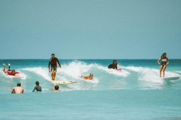 People surfing on Gold Coast Beach