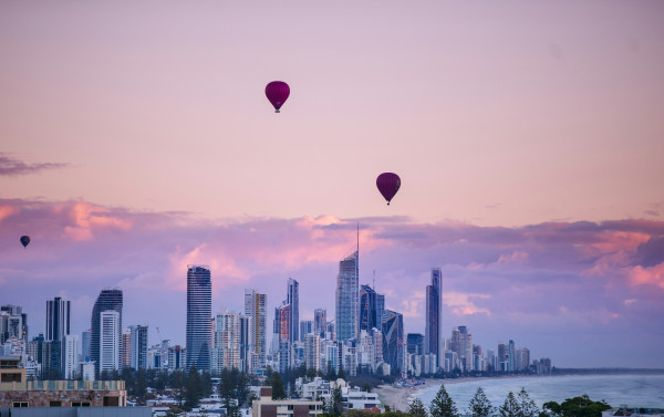 Gold Coast skyline with hot air balloons flying